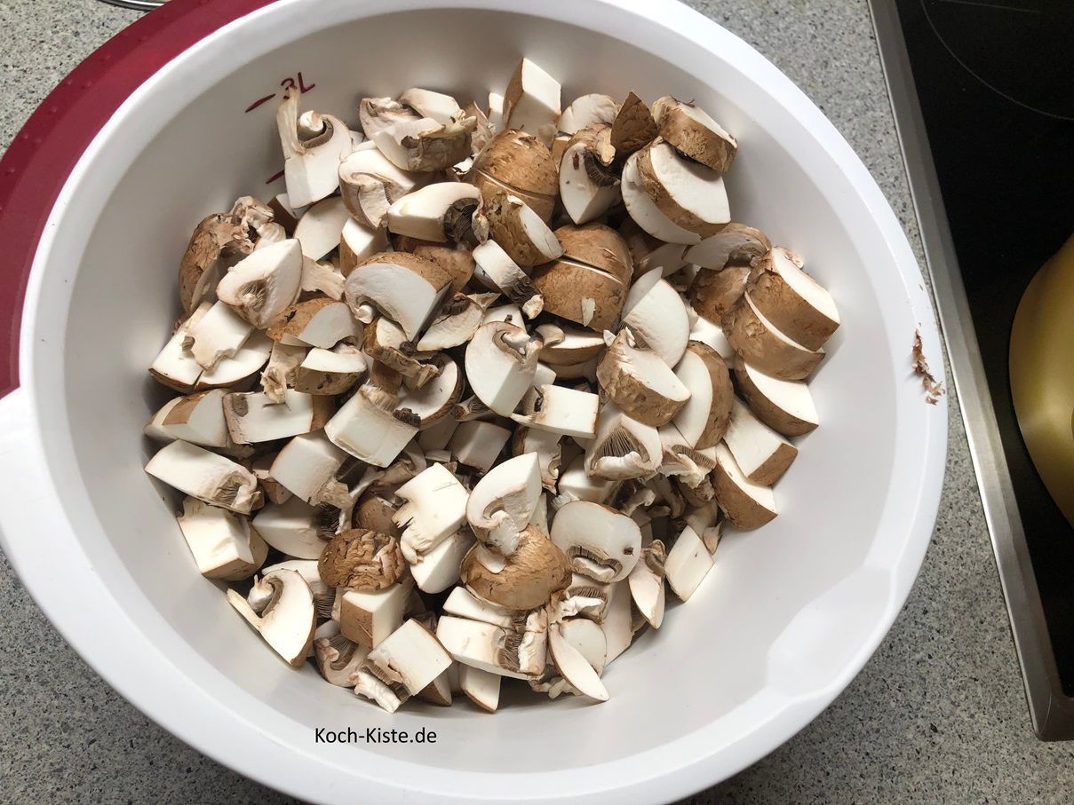 gebe die Champstücke in eine Rührschüssel