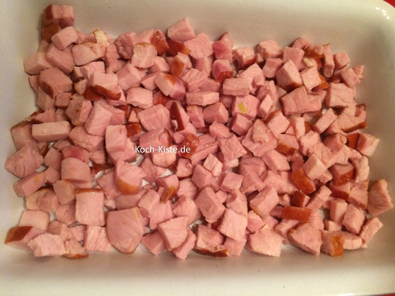 Kassler in die Auflaufform geben