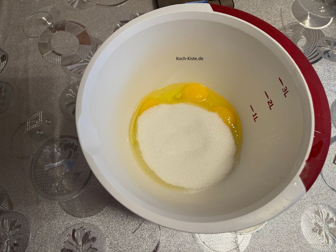 dann stelle die Rührschüssel auf die Küchenwaage auf 0 und wiege 300g Zucker ab