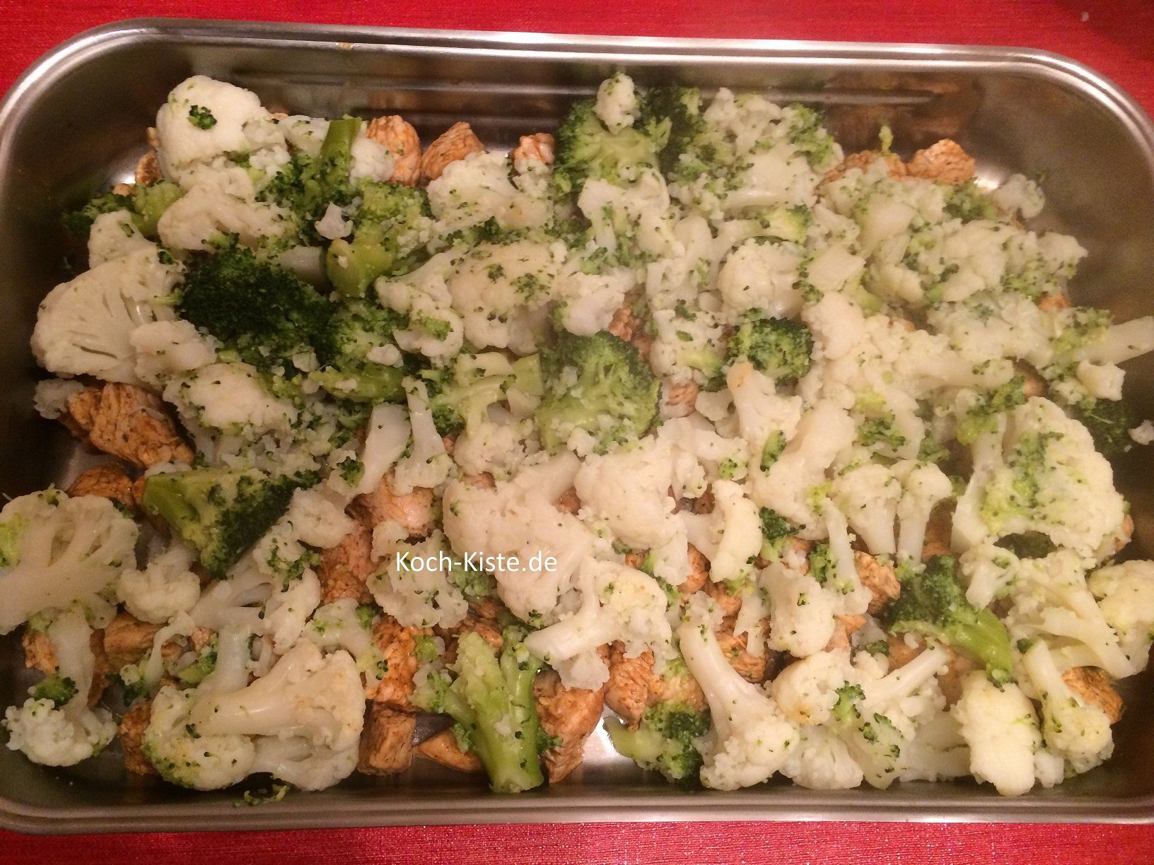 Blumenkohl- und Brokkoliröschen oben auf geben