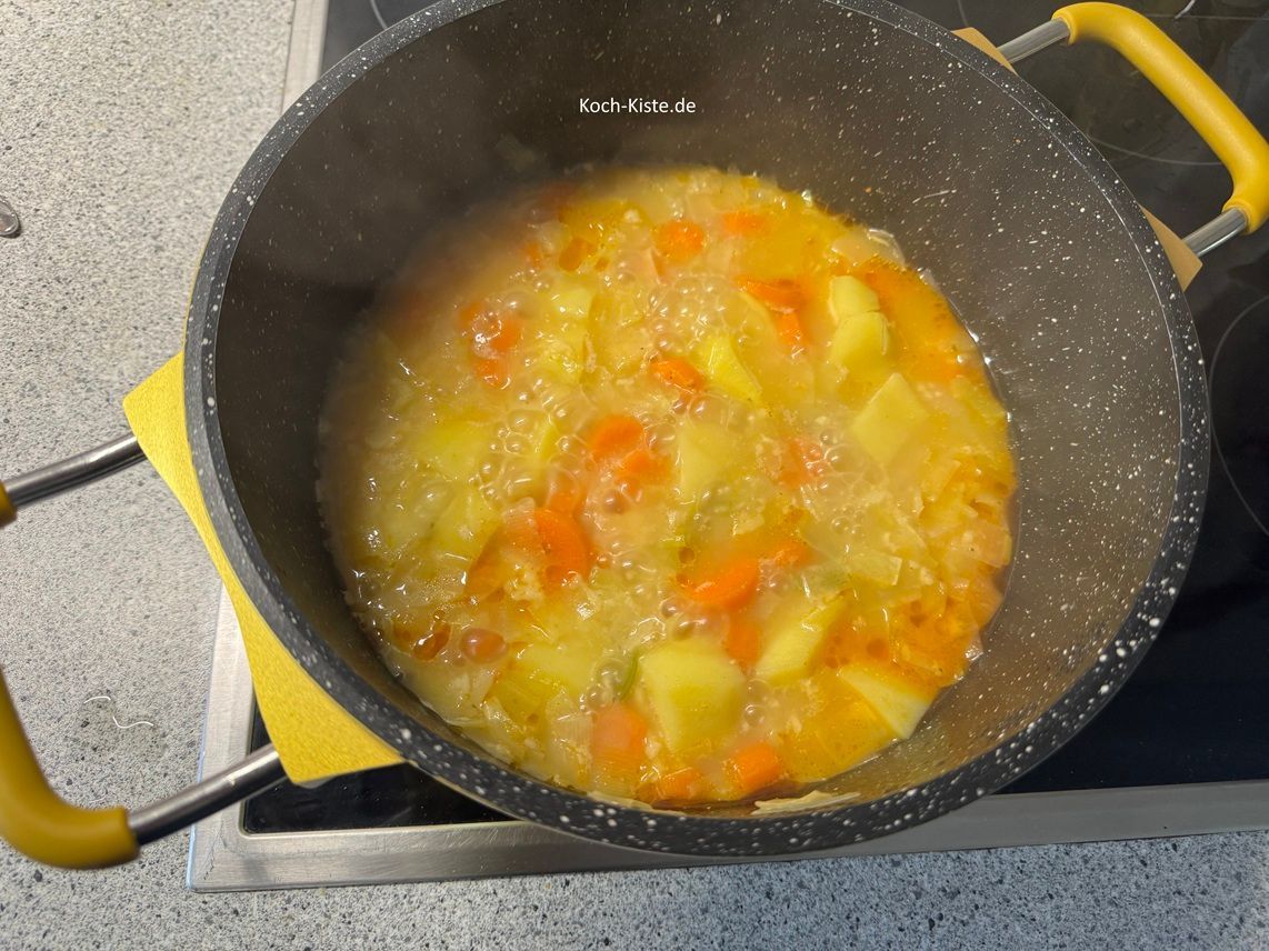 lasse alles weiter köcheln, damit sich der Käse auflösen kann