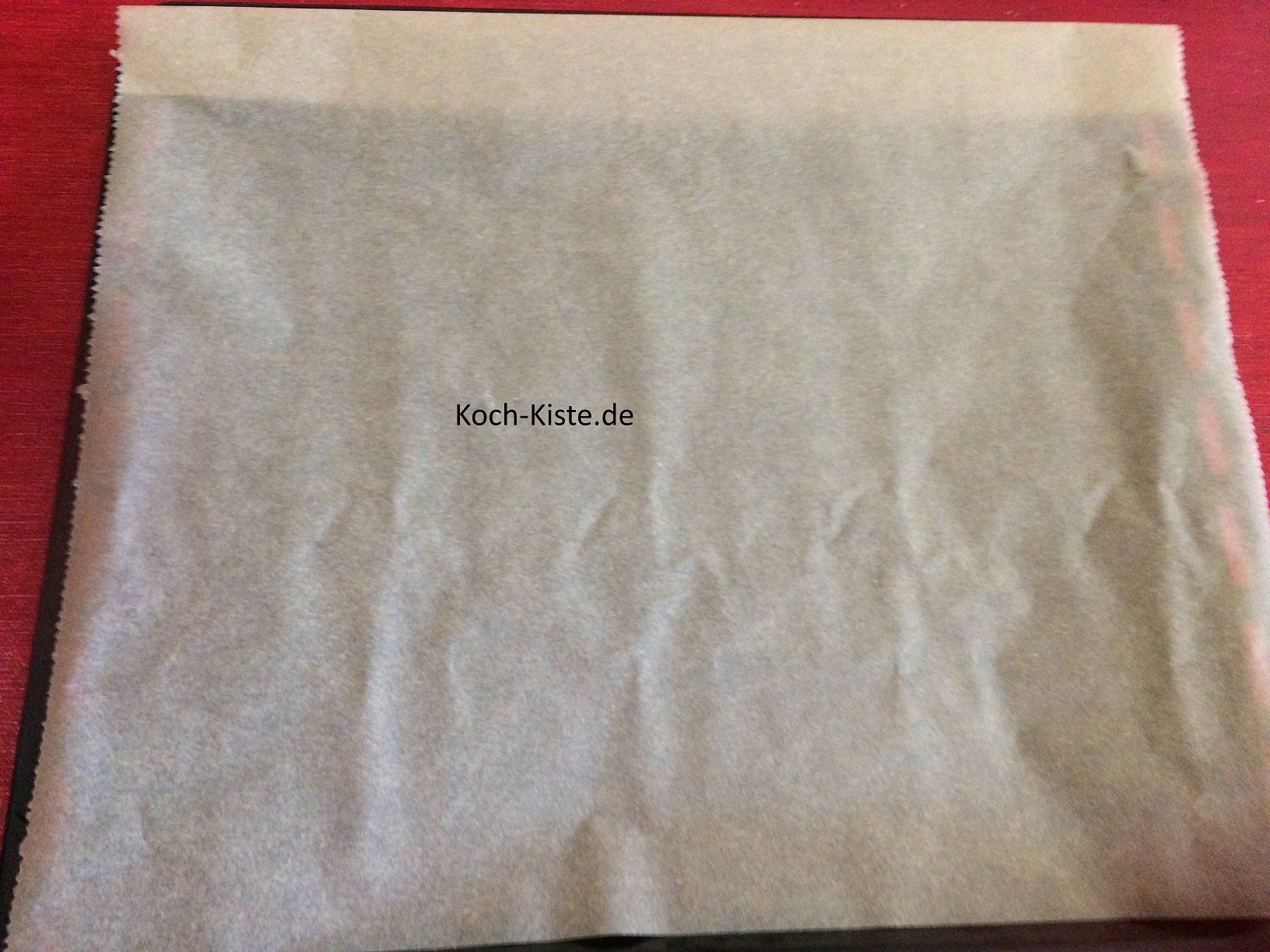 Backblech mit Backpapier belegen