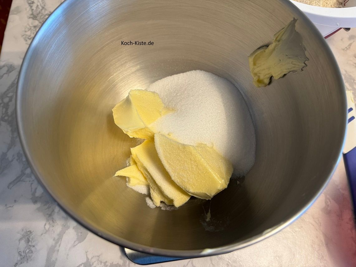 stelle die Küchenwaage wieder auf 0 und wiege den Zucker ab