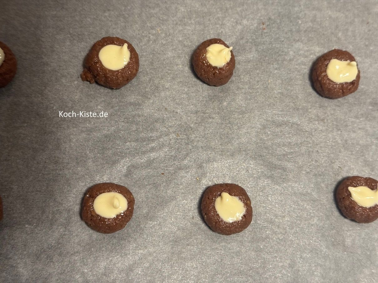 ruhig soviel Kuvertüre das das Lock komplett gefüllt ist