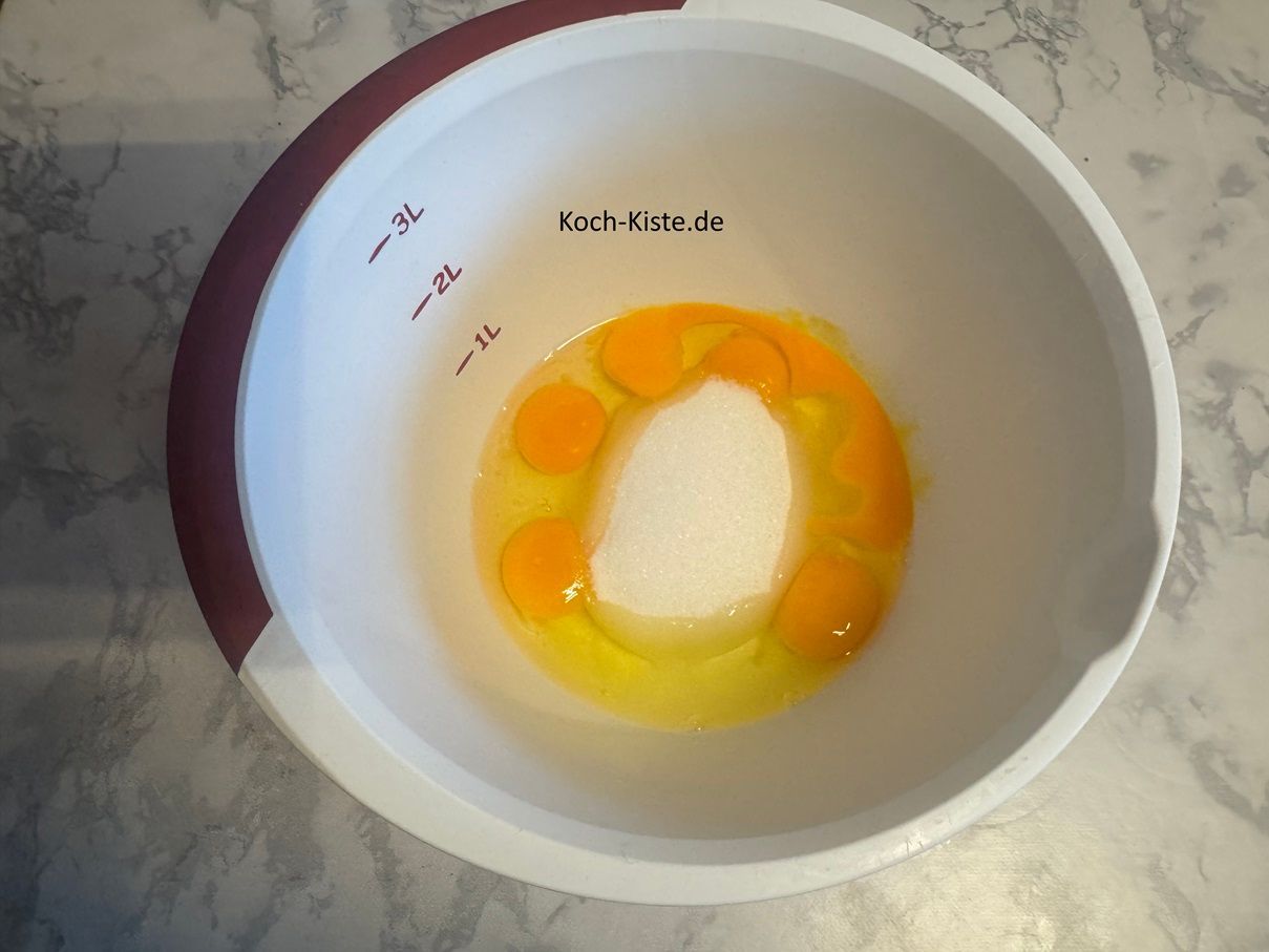 stelle die Rührschüssel auf die Küchenwaage auf 0 und wiege 150g Zucker ab