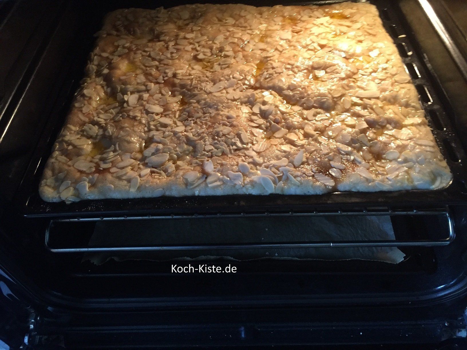 schiebe das Backblech in die Mitte des Backofens