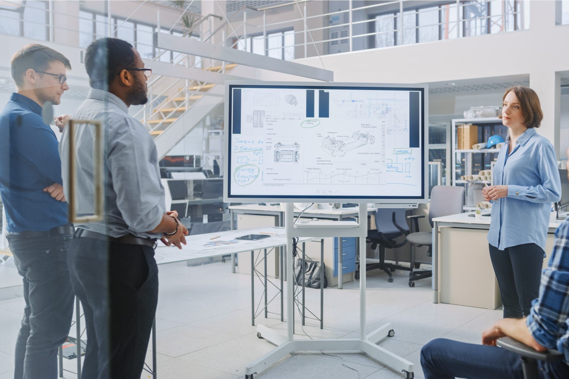 man in front of whiteboard