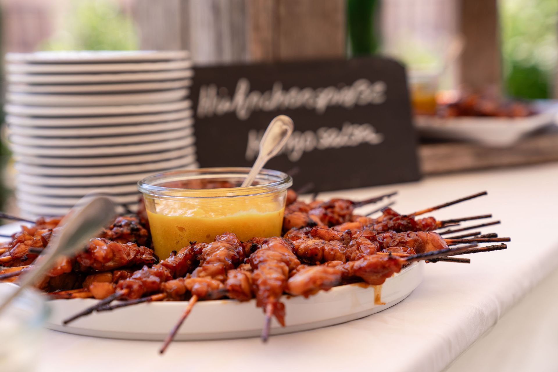 Sektempfang im
Kräutergarten der Orangerie des Kloster Bronnbach, Snacks Details