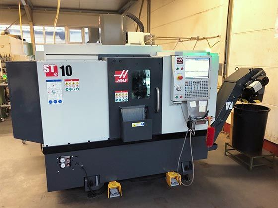 Haas VF2 4-Achs CNC-Bearbeitungszentrum Haas VF2 (CNC-Fräszentrum) mit 4-Achsen (Simultan)