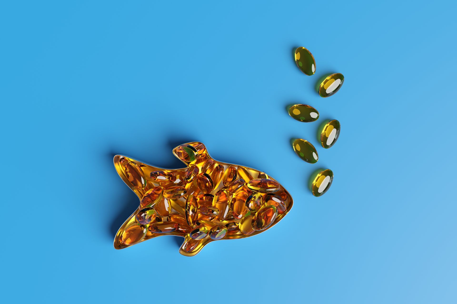 Omega-3-Kapseln auf blauem Hintergrund – Symbol für entzündungshemmende Wirkung und gesunde Ernährung