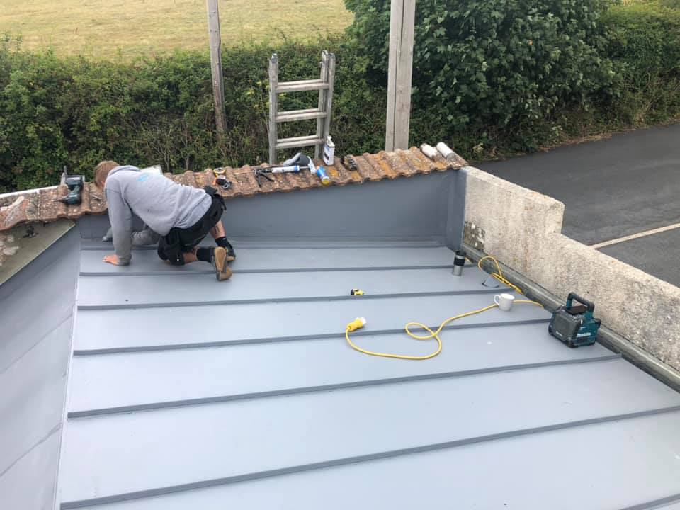 Flat roofing for modern home extensions in Torquay