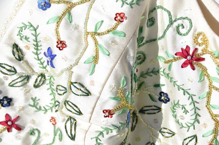 Close up of the finished dress showing the wonderful embroidery.