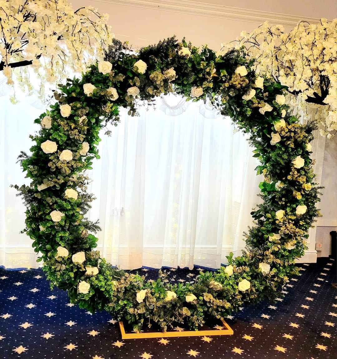 6ft round moongate with greenery and roses