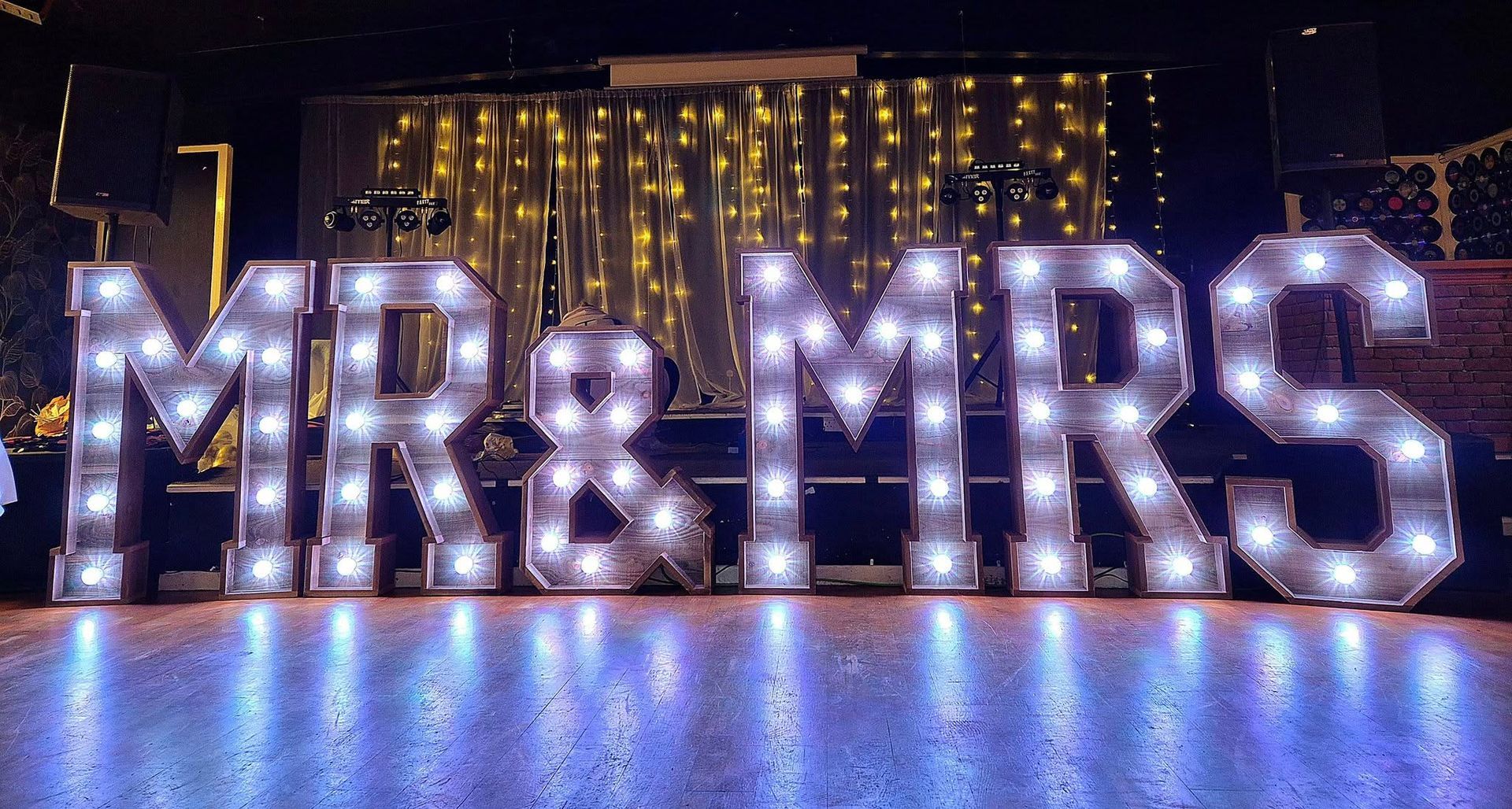 Light up rustic Mr and Mrs letters available for hire in Cheshire.