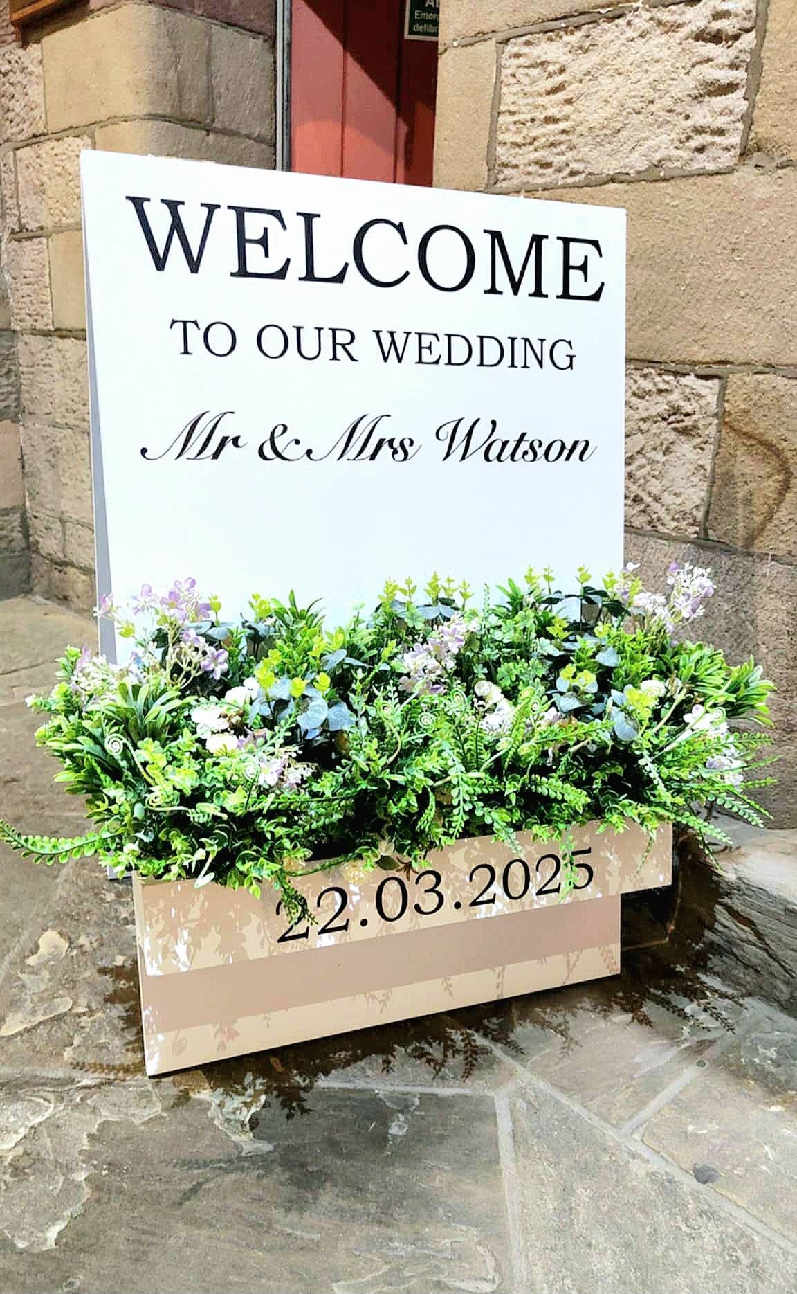 Personalised flower box welcome sign that can have any message printed on it along with choice of flowers.