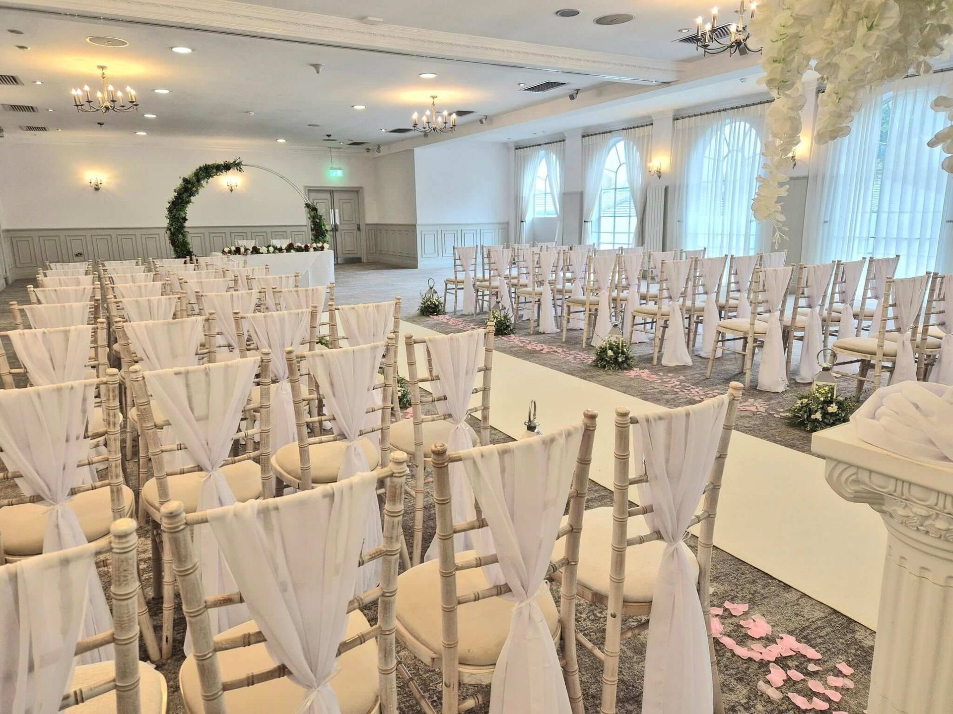 Wedding decorations hire include White and Ivory lace wedding ceremony styling