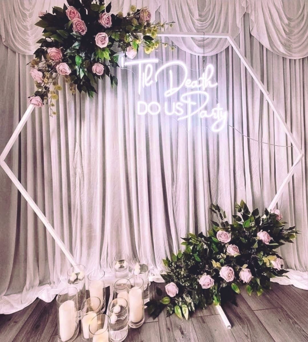 Hexagon geometric frame with til death do us party neon sign used for wedding backdrop