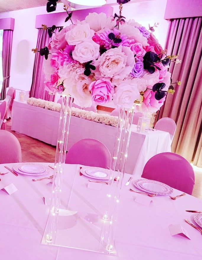 Acrylic stand centrepiece with flowers