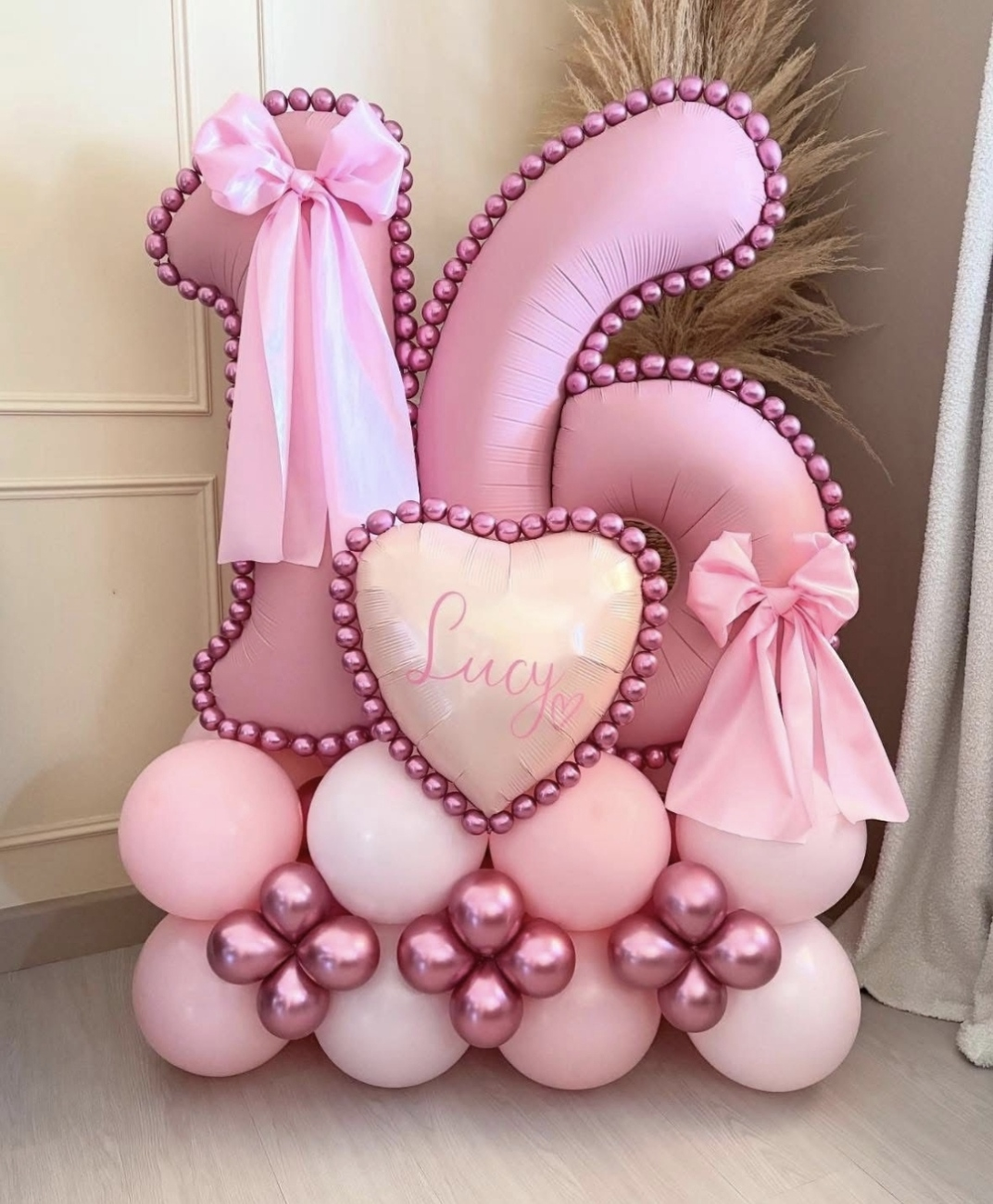 Number 16 birthday balloon garland display