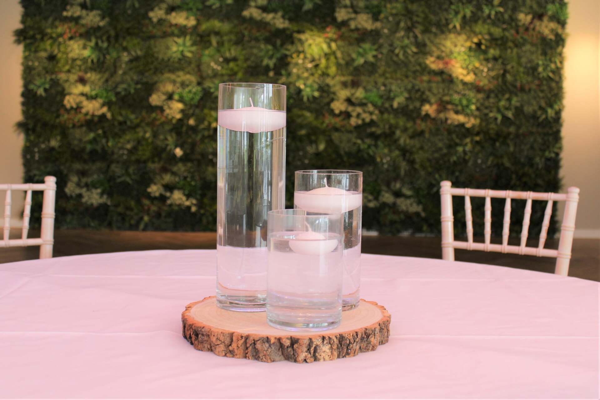 Cylinder vase centrepiece with floating candle