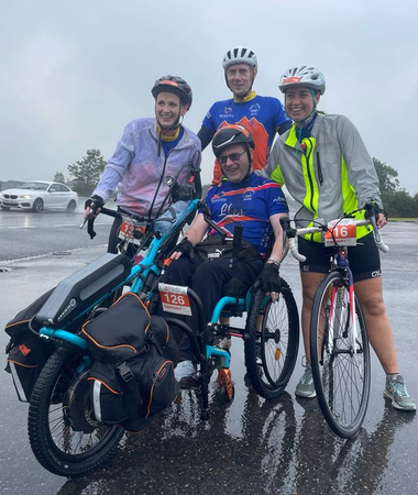 Members of Morrello Marvels during the 2021 Carten100 Cycle Paracyclists smiling during a cycle