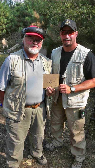 Jon Thompson (Riverside Sports sporting gear founder) with Mike Seeklander