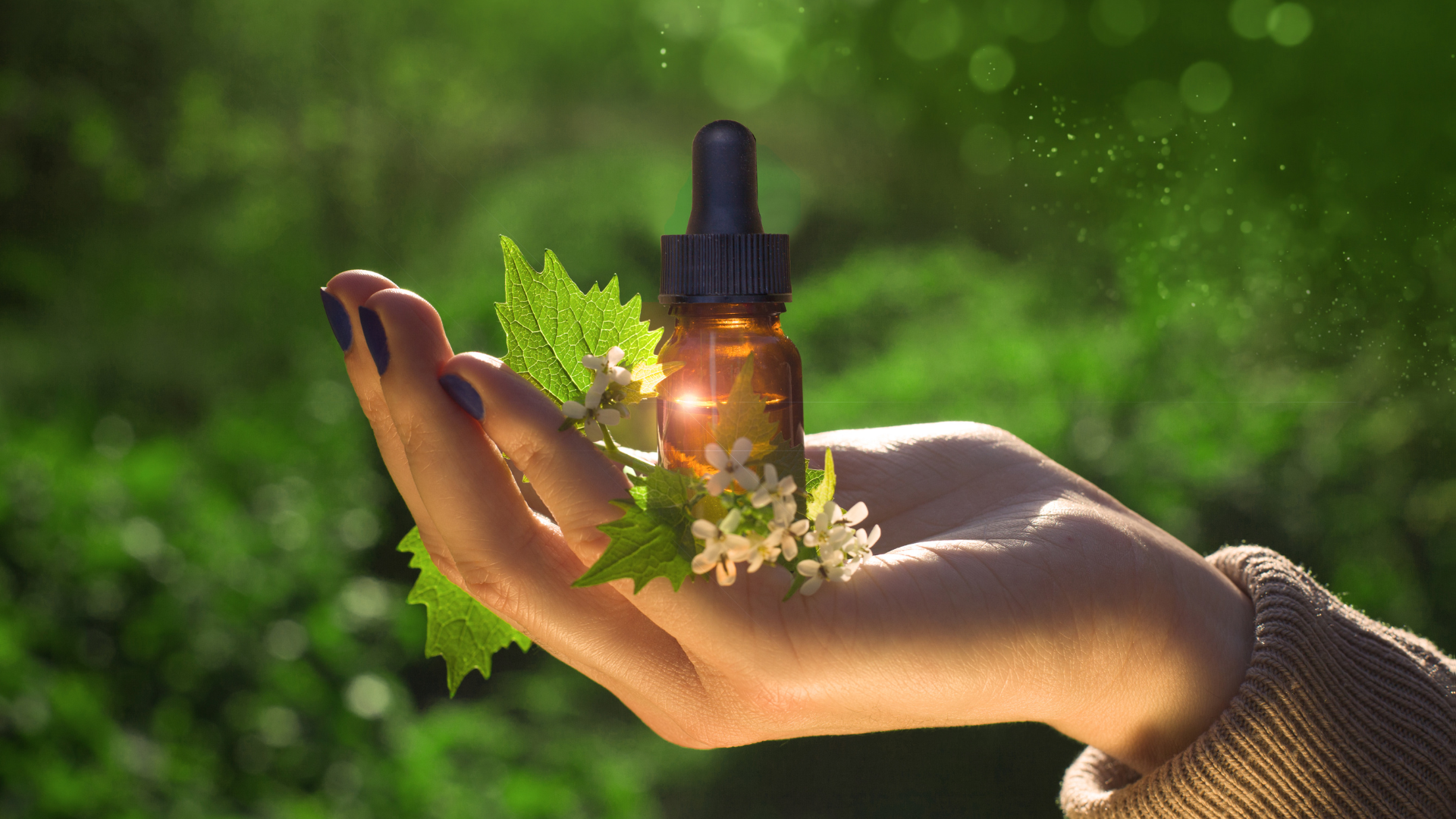 Bachblüten- Öl in offener Hand