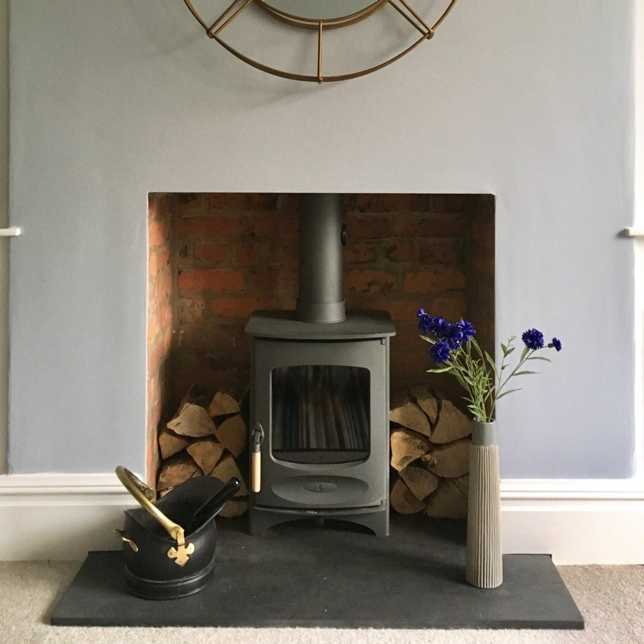 Brick chamber with a brazilian slate hearth and Charnwood C4 defra approved woodburning stove