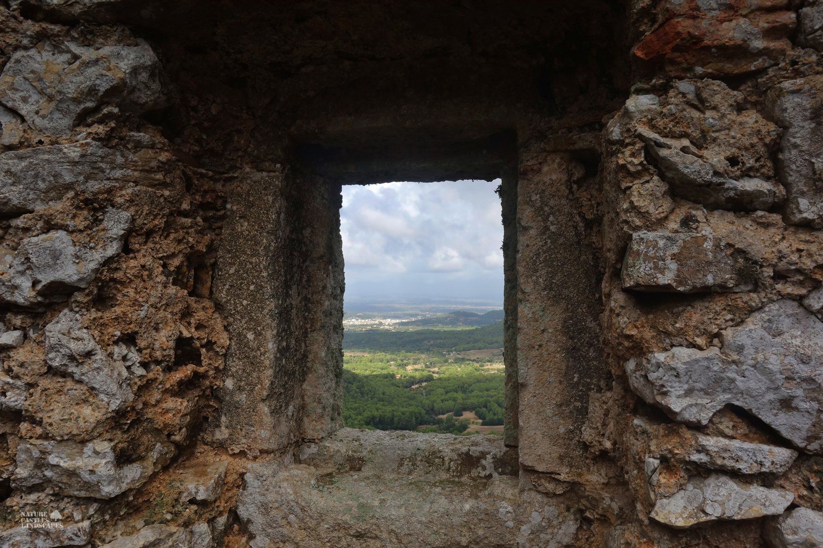 Castell de Santueri landscape behind window