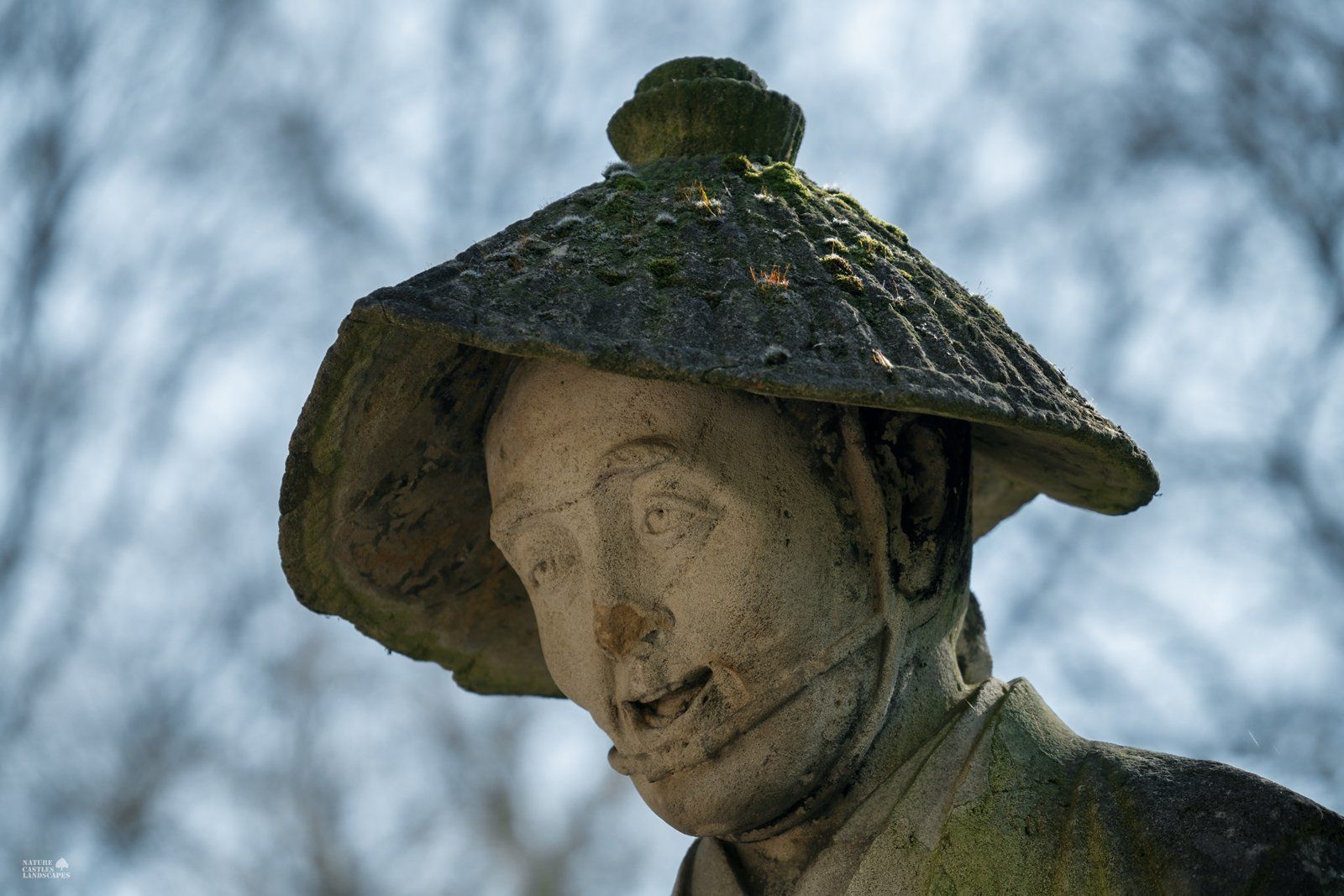 Sculpture at the chinese fountain picture farmer