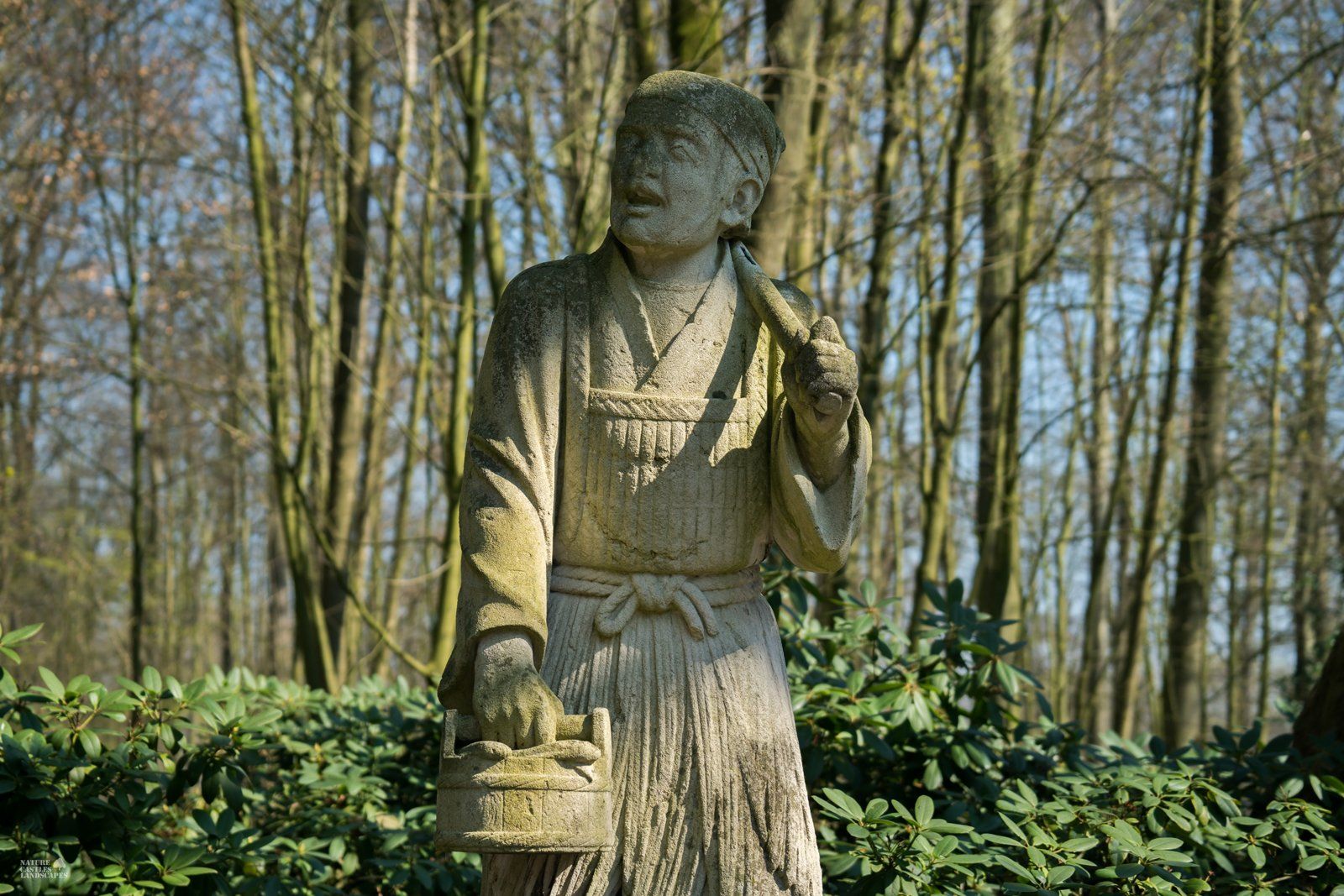 Sculpture at the chinese fountain picture fisherman