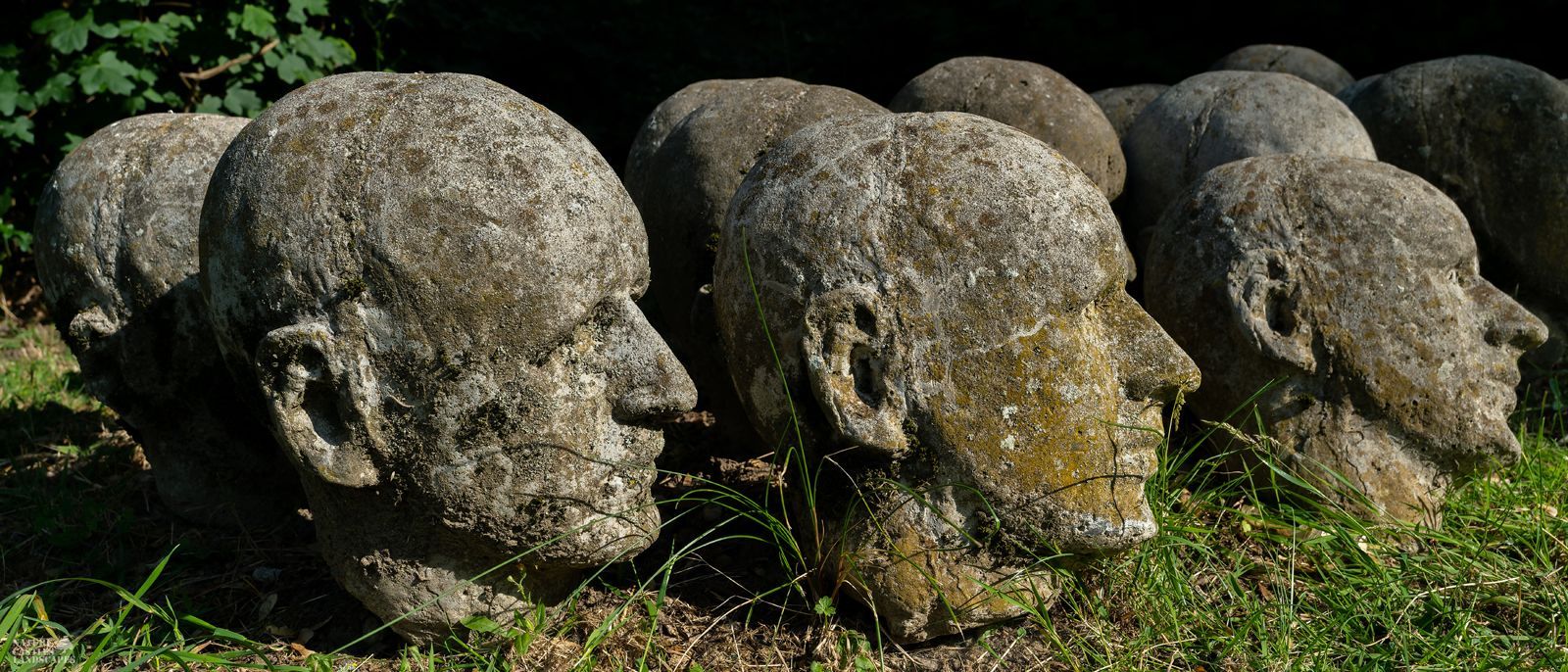 concrete heads as art