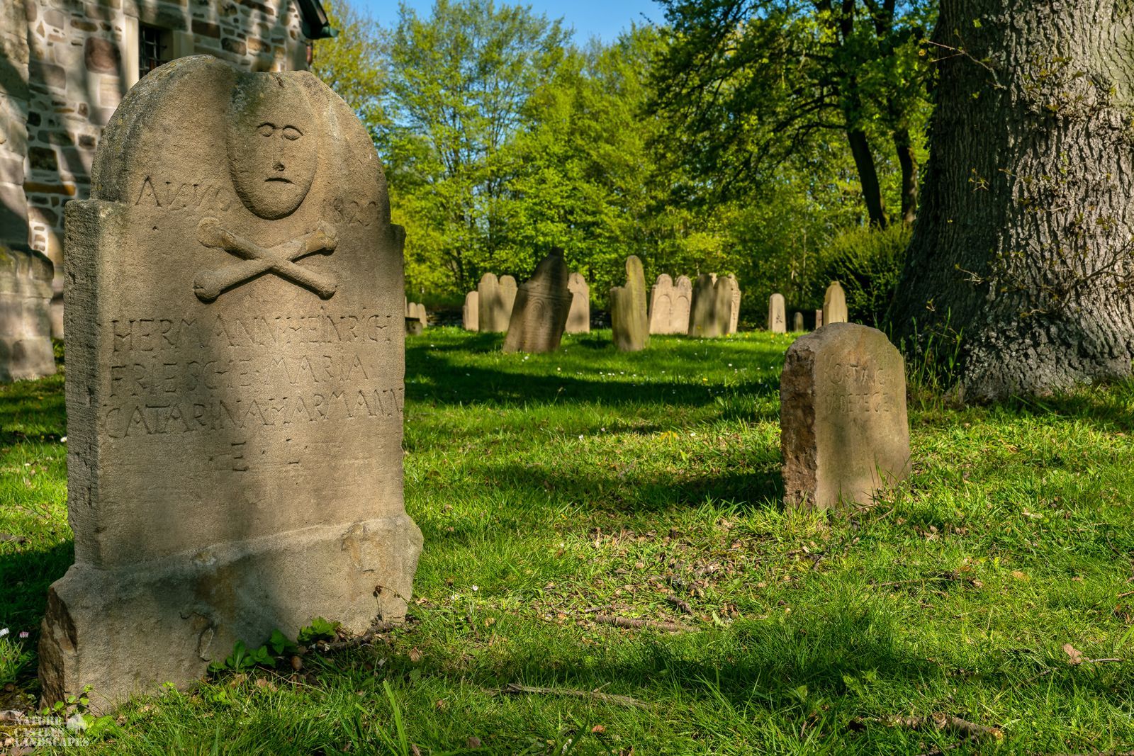 historic graveyard at the village church in bochum