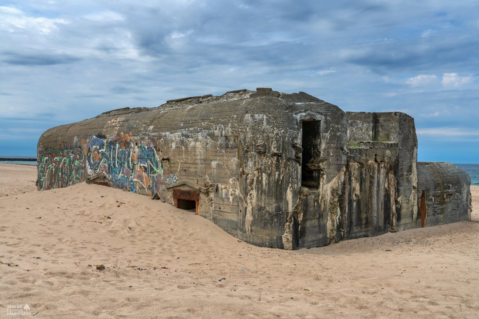 Picture of abandoned bunker with graffito