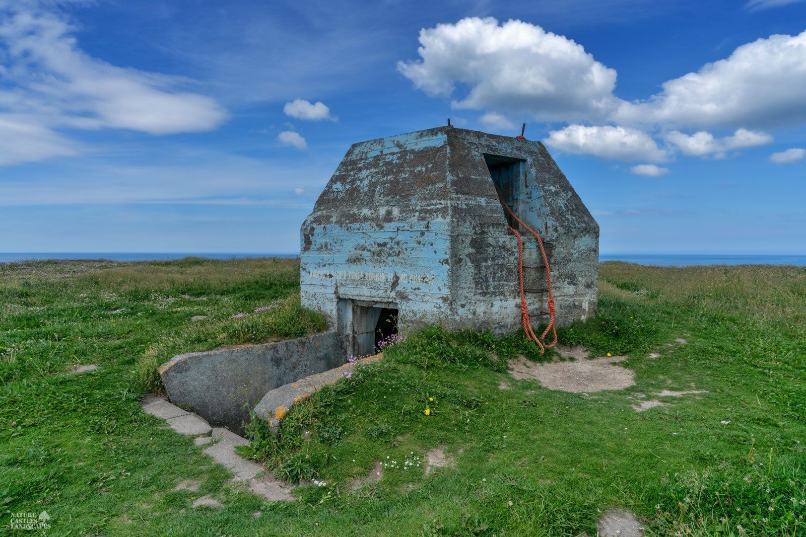 blue sky over the old foundation of the radar system