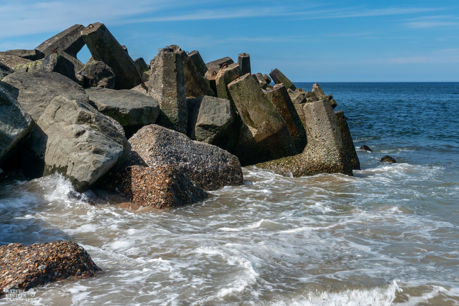 Danish North Sea coast breakwater on the sandy beach