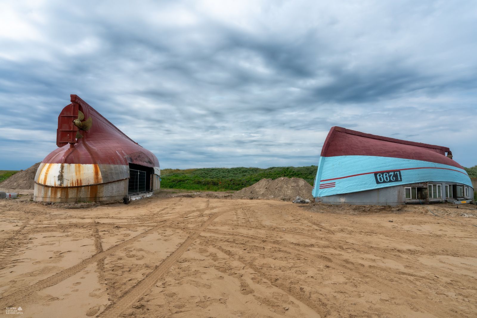 Two upturned fishing boats on the grounds of the Sea War Museum Jutland.