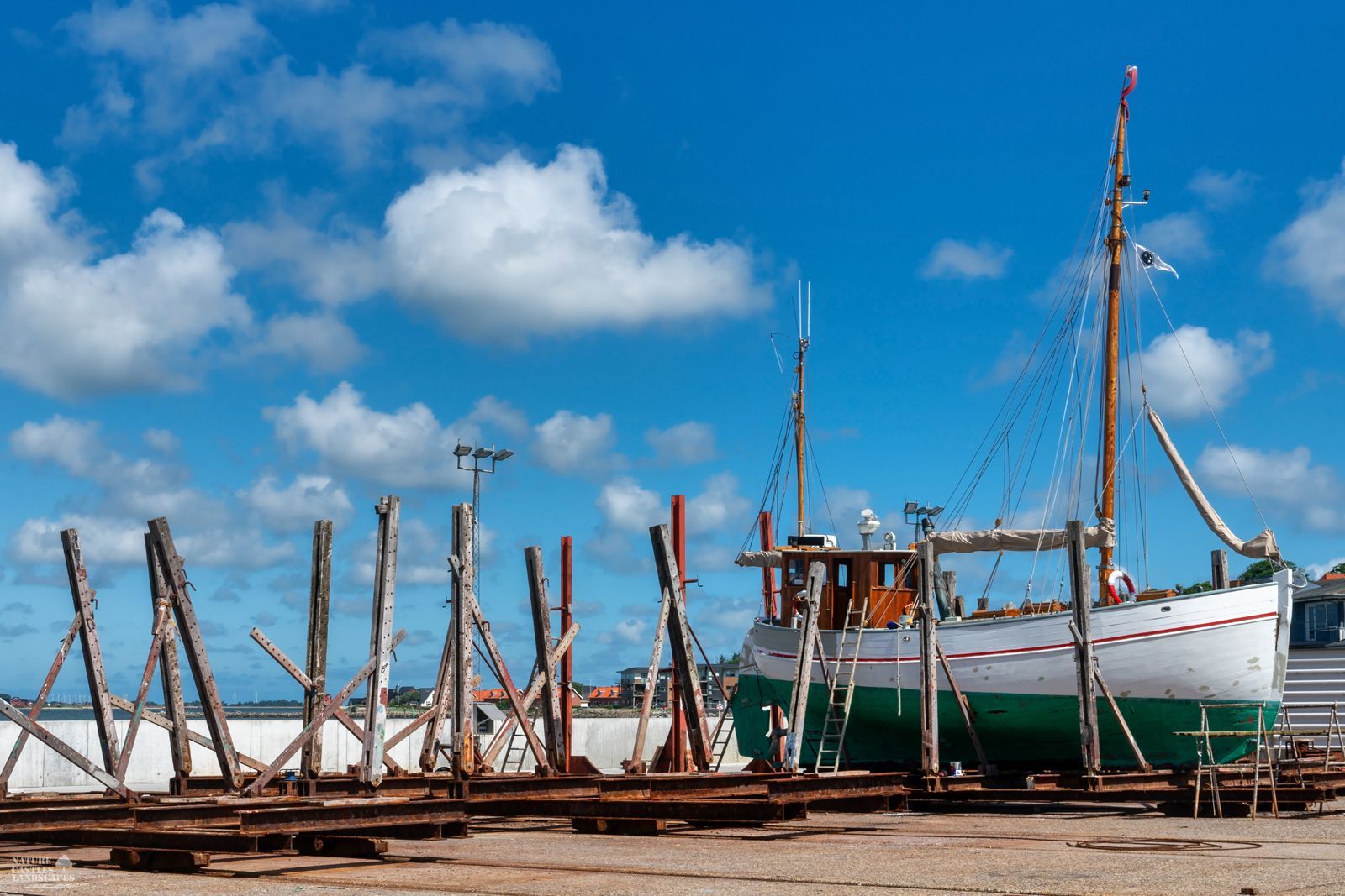 a small fishing boat in dry dock on the Danish North Sea coast