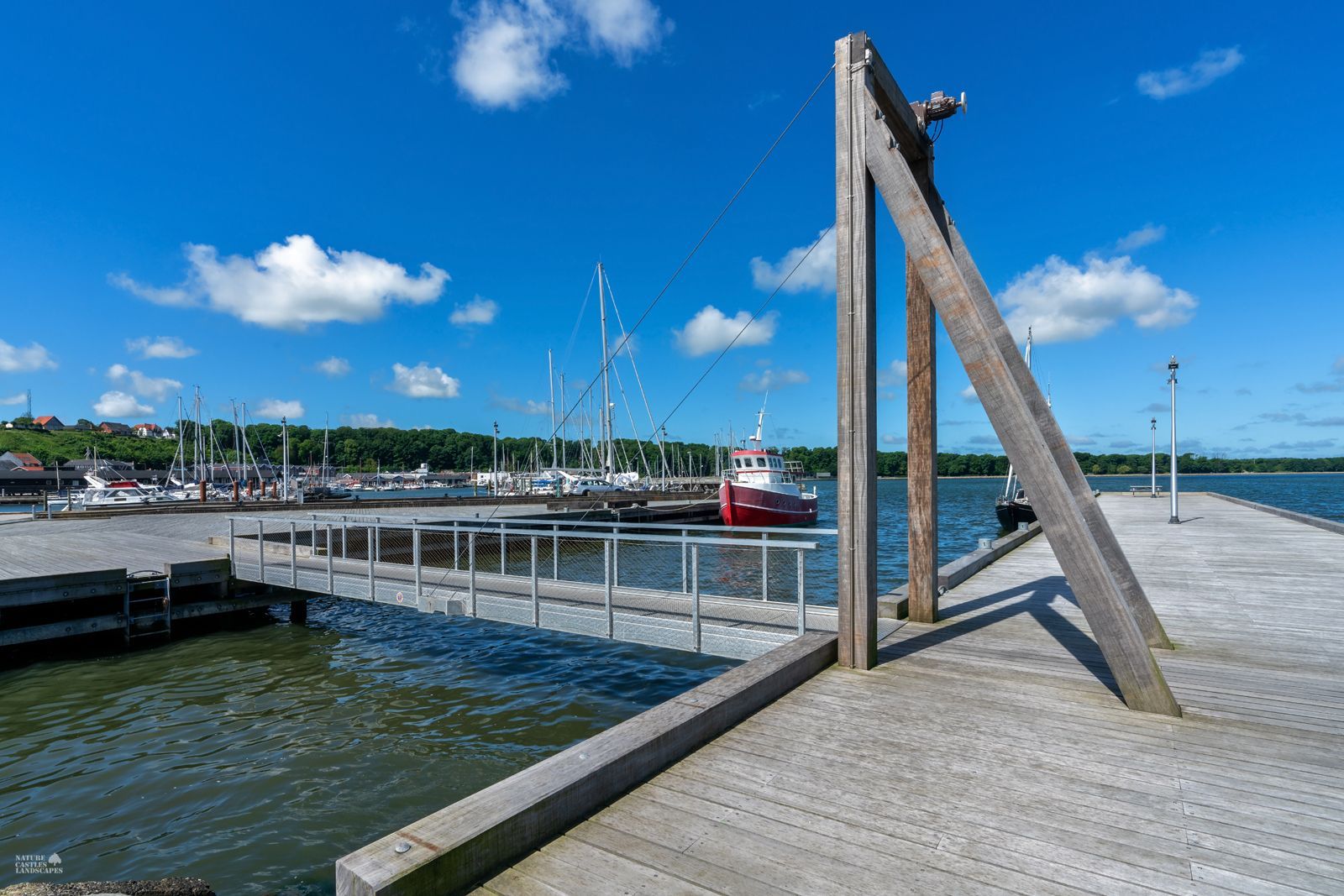 a small drawbridge in a harbor on the Danish North Sea coast