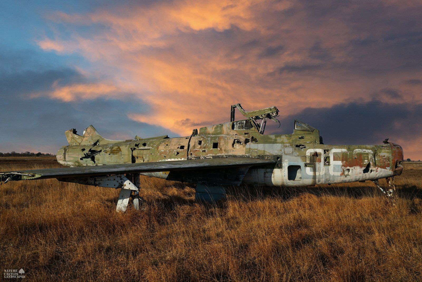 rusty jet F-84 at the military training area