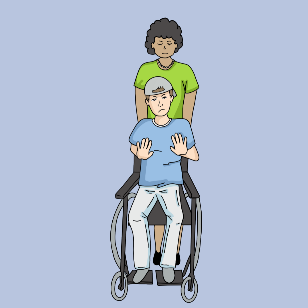 Ein junger Mensch mit dunklen Locken steht hinter einem jungen Mann im Rollstuhl. Der junge Mann trägt eine graue Mütze, hebt beide Hände abwehrend und schaut skeptisch.