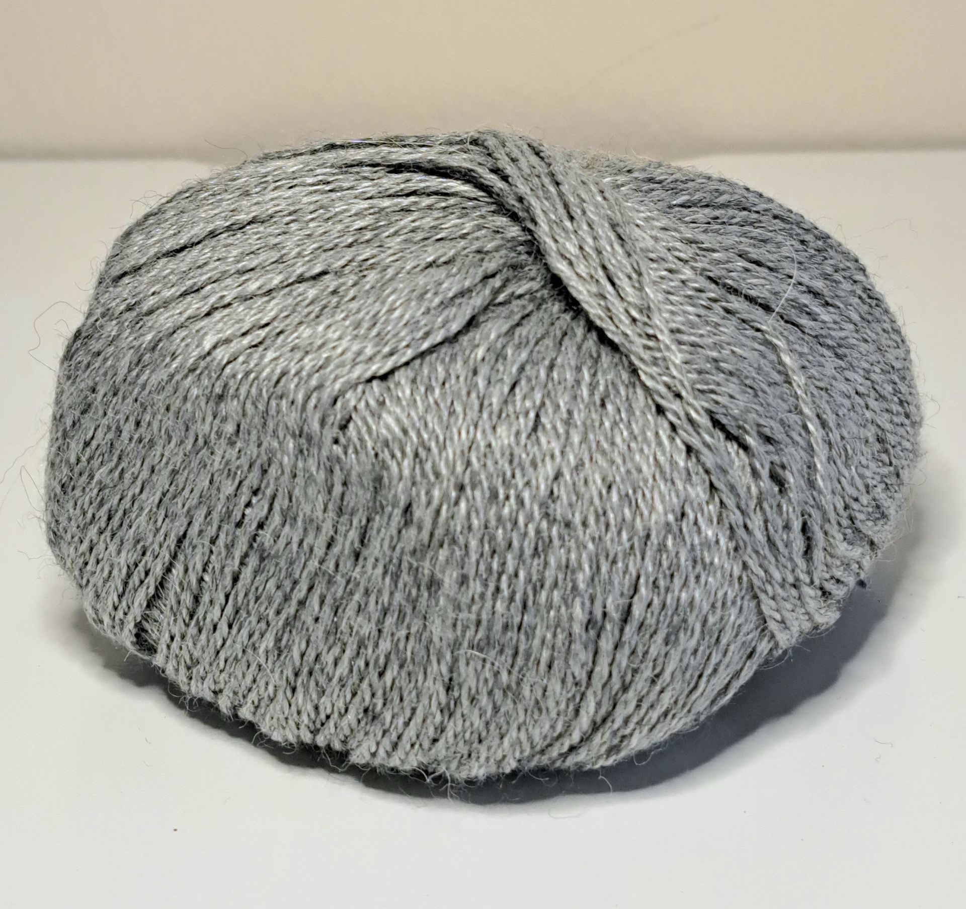 Lanamania Silky hand knitting yarn ball 50g ball of Lanamania Silky hand knitting yarn - 70% baby alpaca 30% mulberry silk-in color Silver- a middle melange grey