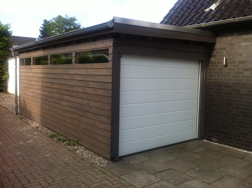 Carport mit Stülpschalung Carport mit Sektionaltor, Thomas Berger, Oldenburg