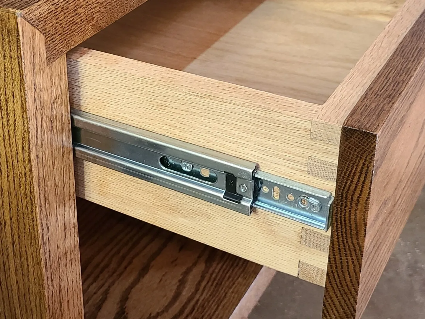 Solid oak end table with box joint drawers