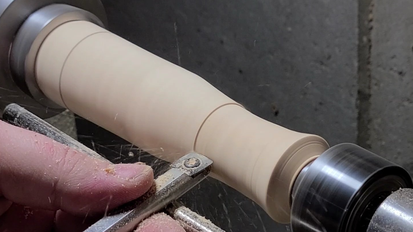 Wood turning a bottle opener