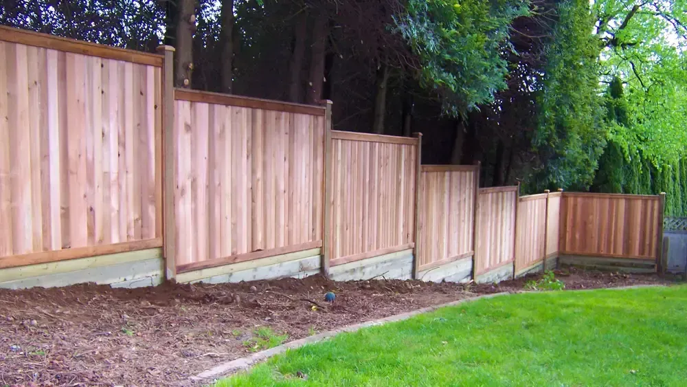 Does a fencing contractor require a deposit before beginning work?