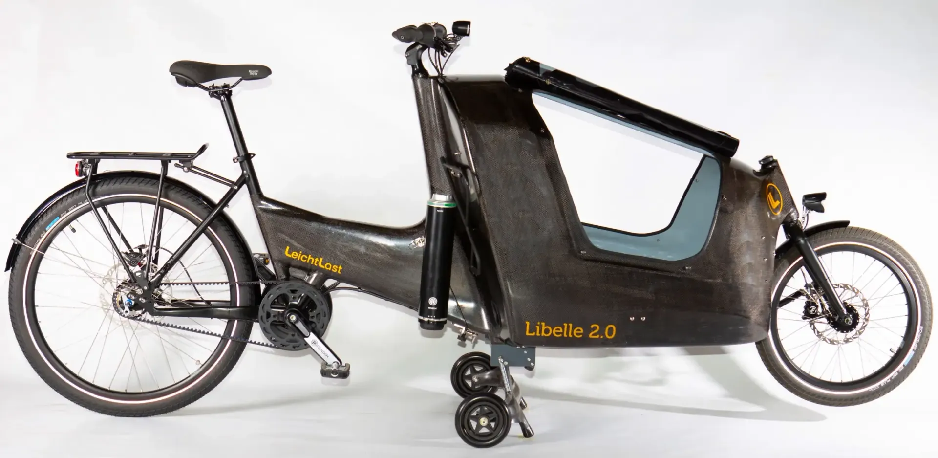 Das LIBELLE-COMFORT-Modell mit Family-Ausstattung und kleinem Akku Das LIBELLE-COMFORT-Modell mit Family-Ausstattung und kleinem Akku. Ultraleicht, aus Carbon und teilbar. Bei lastenrad-profis.de