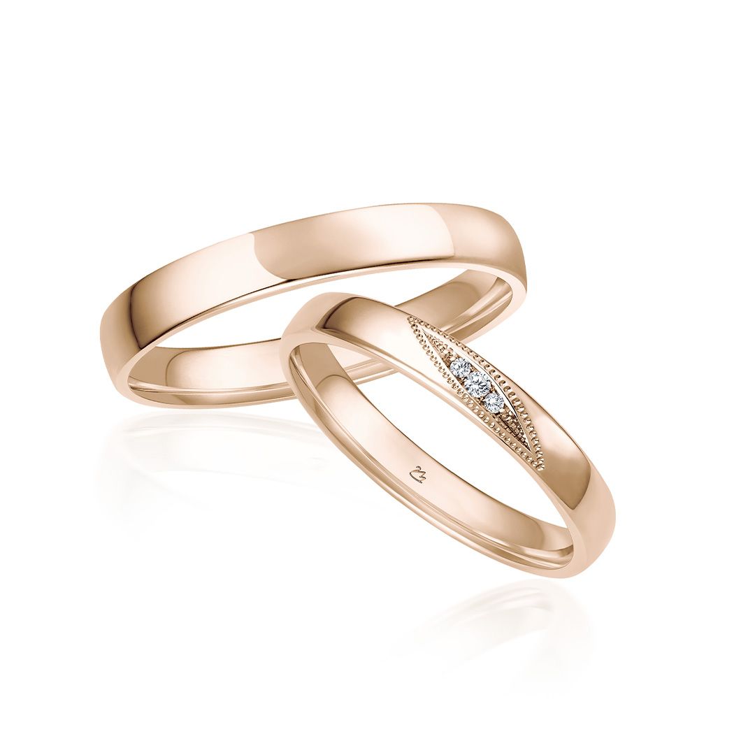 Wörner Trauringe Twinset Brillant Rotgold perlierter Rand