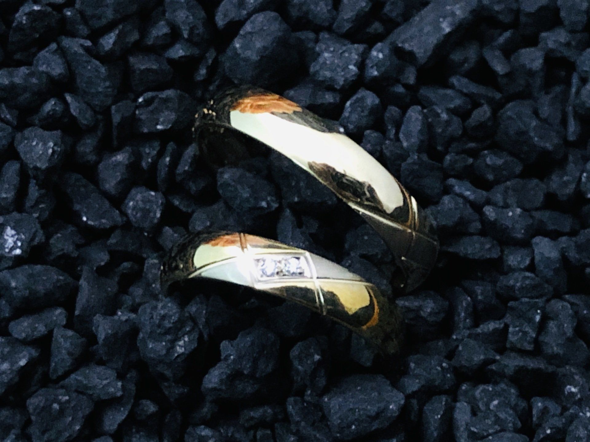 Trauringpaar aus unserem Online Shop / Trauring Sale Trauringpaar in Gelb/Weißgold 585/000 mit zwei Brillanten 0,03ct TW/Si