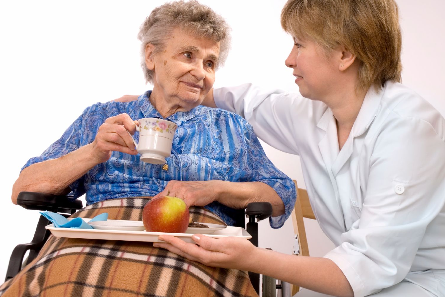 Pflegekraft bei Essenbelieferung